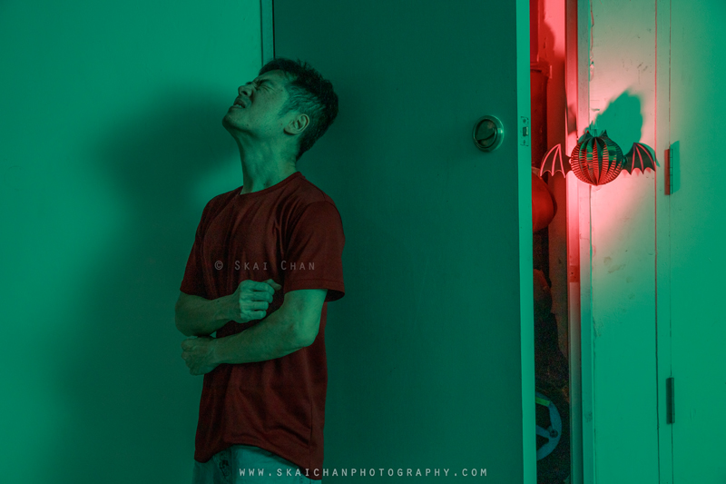 Skai reacting with exhaustion and disbelief beside the CCS riser during a conceptual Halloween self-portrait shoot