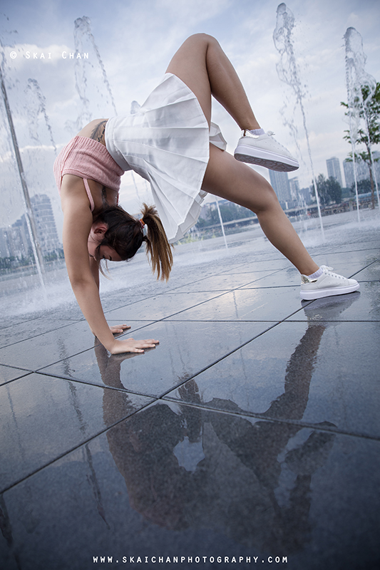 outdoor dance photoshoot on wet ground